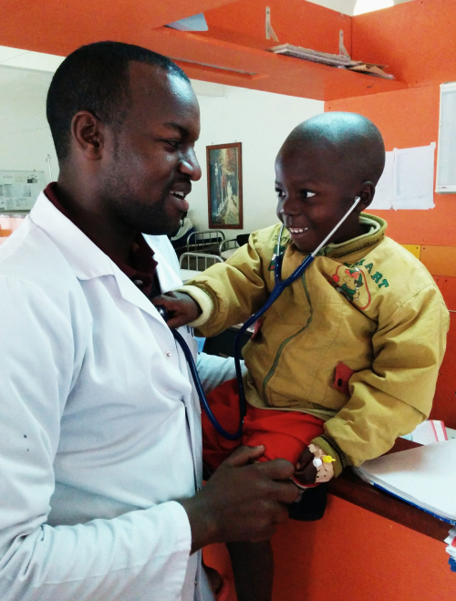 Dr Fidel and pediatric cancer patient at Butaro_1